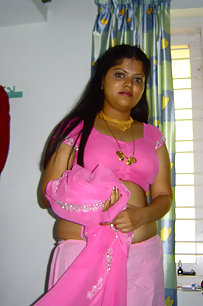 Delicious Neha bhabhi stripping her pink saree off showing pussy