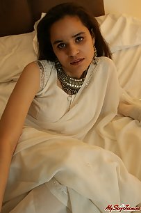 Jasmine Mathur in white indian saree looking hot teasing her man