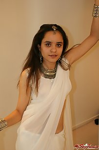 Jasmine Mathur in white indian saree looking hot teasing her man