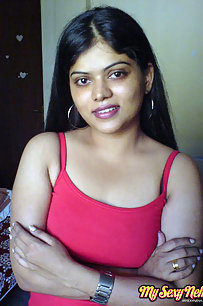 Neha bhabhi in her bedroom showing her juicy boobs