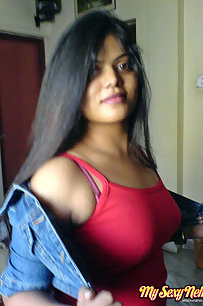 Neha bhabhi in her bedroom showing her juicy boobs