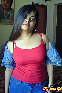 Neha bhabhi in her bedroom showing her juicy boobs