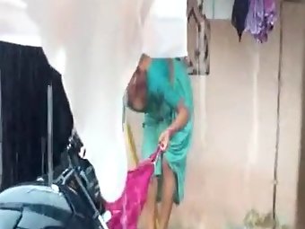 Indian men filming her neighbor doing laundry